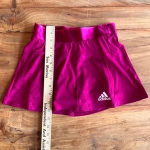 Magenta XS Adidas tennis skirt with panels for a subtle flounce